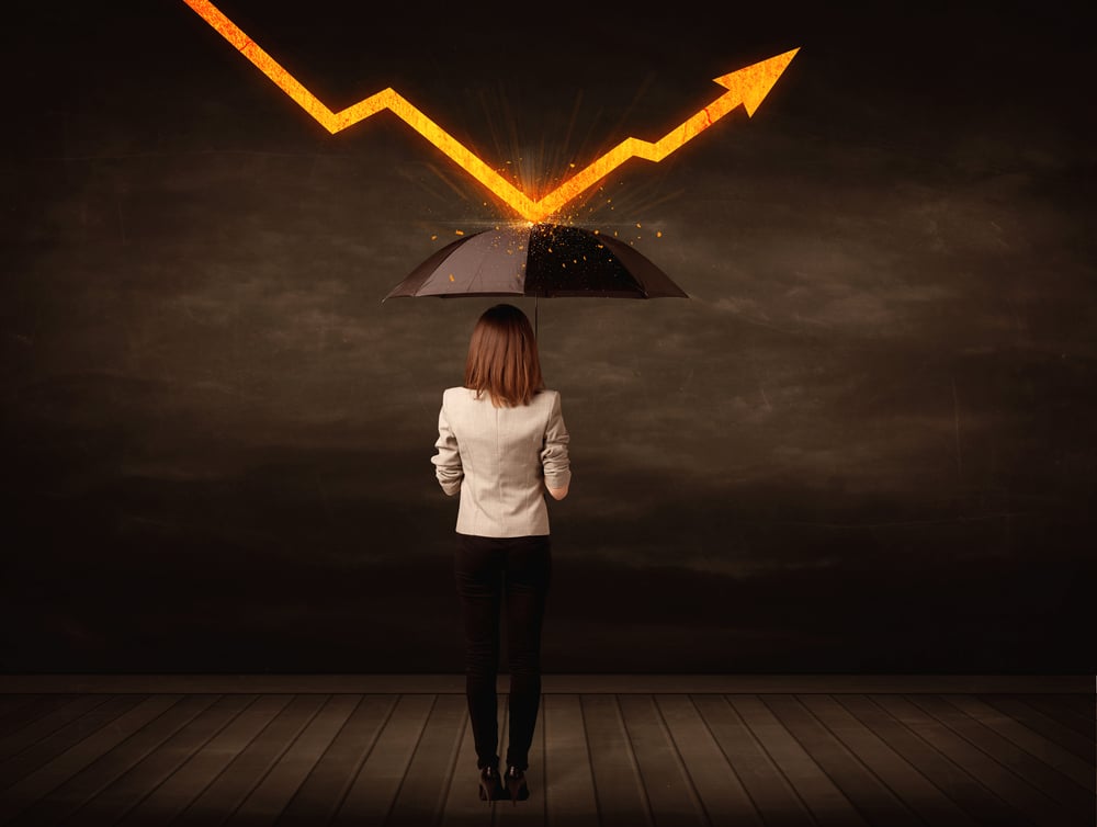 Businesswoman standing with umbrella keeping orange arrow concept on background