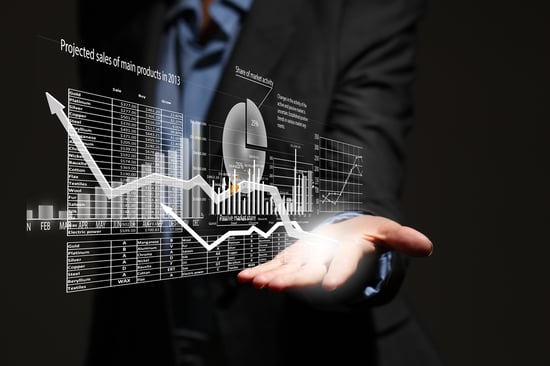 Close up of businesswoman holding graphs in hand-1